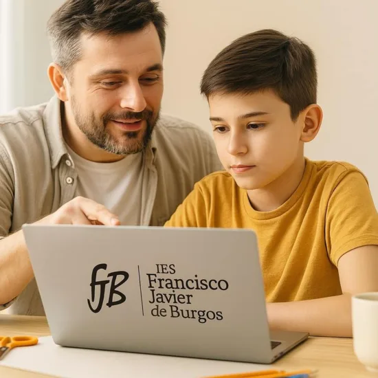 Niño rellenando matrícula online junto a su padre con el logo del IES Francisco Javier de Burgos en el ordenador